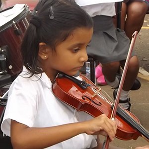 Child playing a violin
